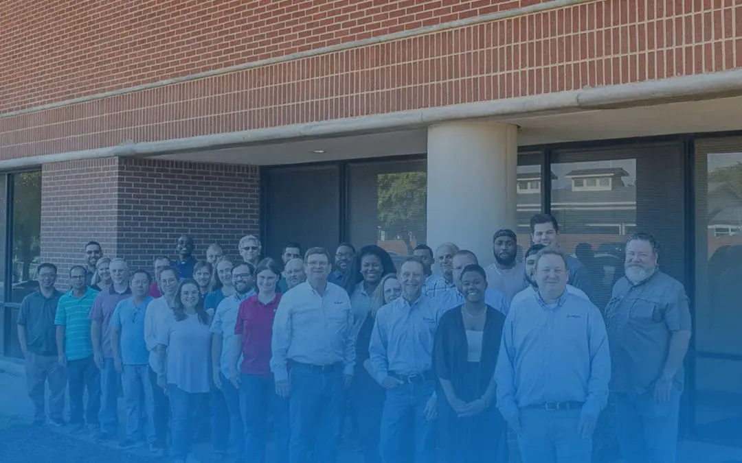 CellGate employees in front of the corporate office with transparent filter