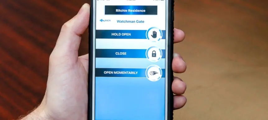 hand holding phone with cellgate app