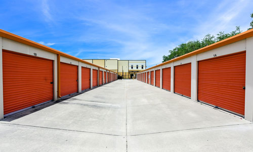 omnipoint-selfstorage_1417688918 self storage orange garage doors row of storage rooms external OmniPoint security access control system