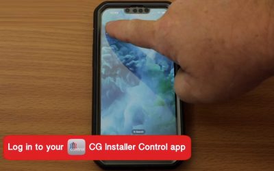 A hand touching a smart phone icon of the CG Installer Control Ap