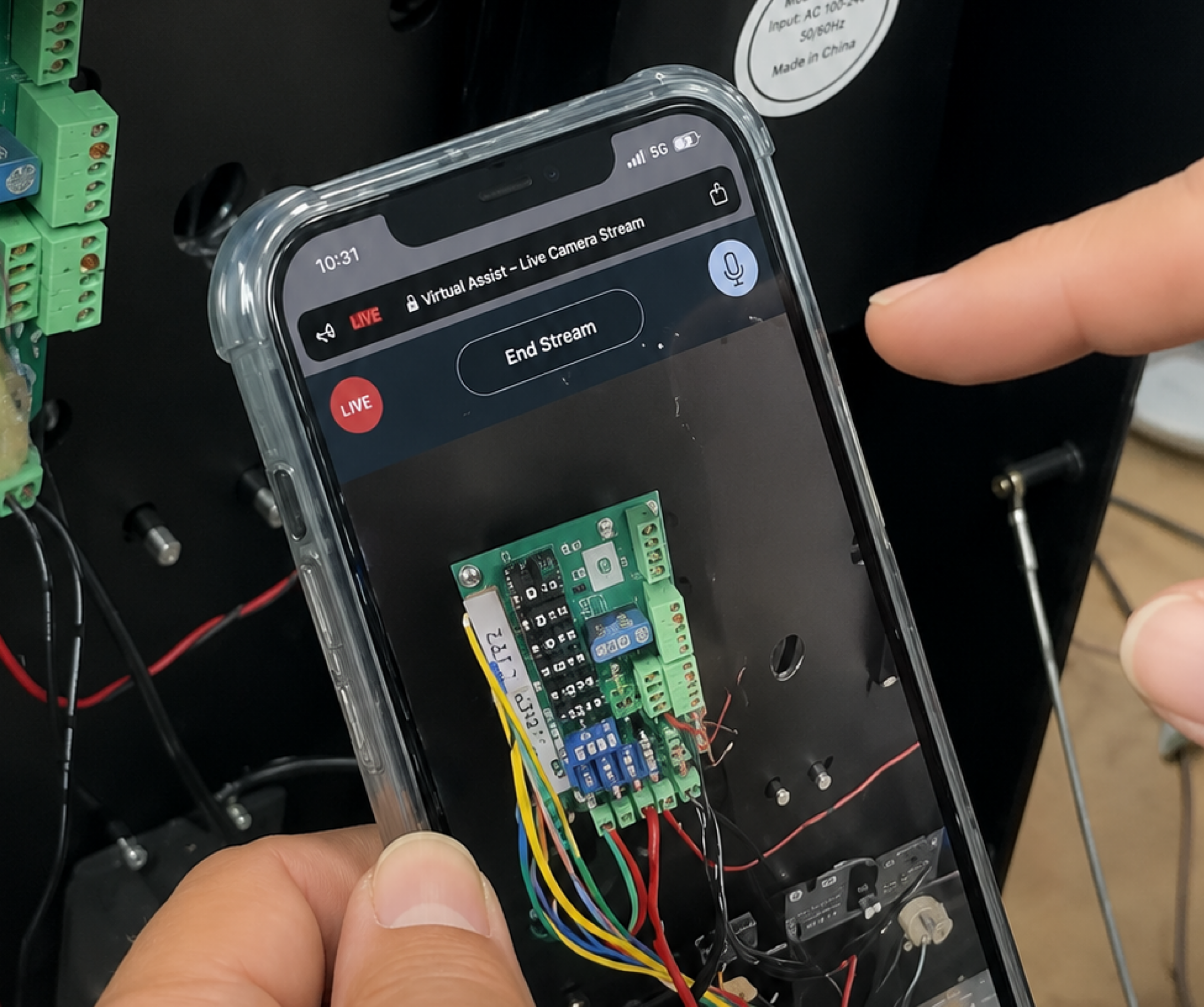 Field technician's phone showing the on-site equipment view